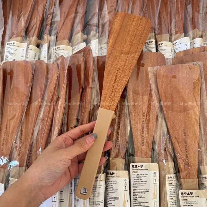 Ebony wood floating spatula
