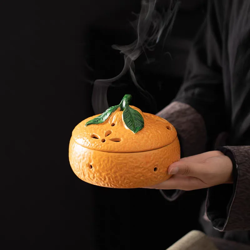 Orange koyel holder
